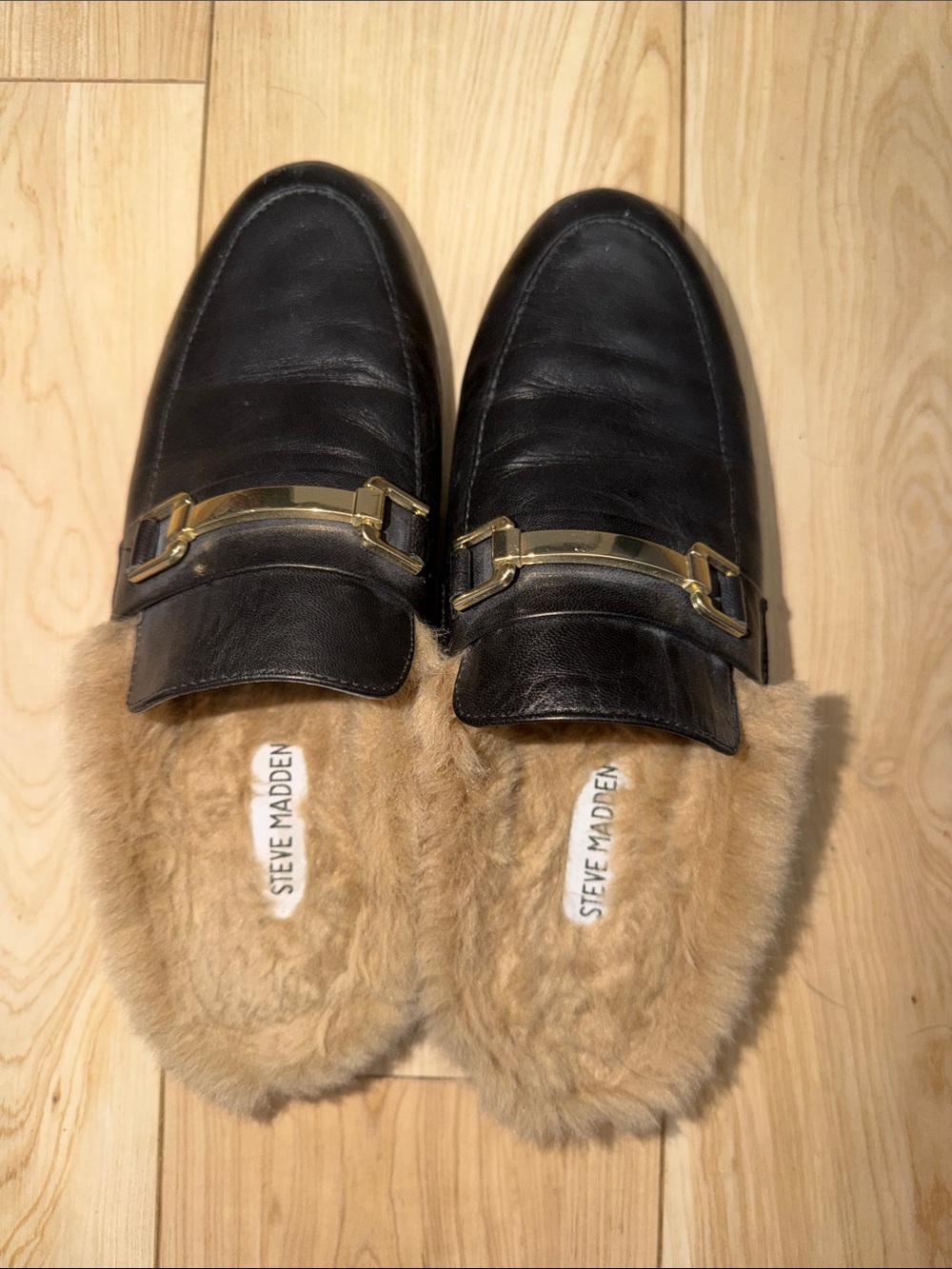 Steve Madden Black Leather Slip-On Loafers with Tan Fur and Gold Accent